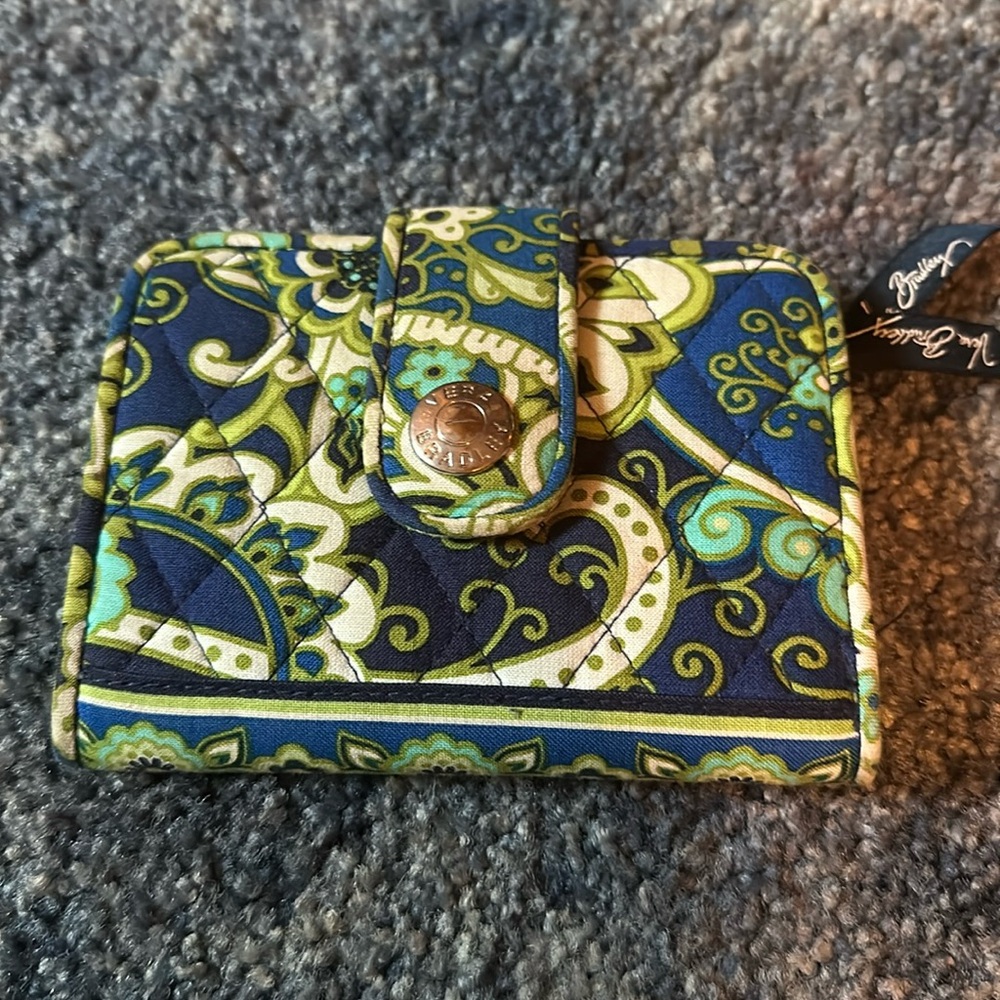 Vera Bradley wallet with magnetic closure.  Excellent condition